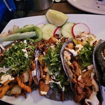 Blue Corn Restaurant and Bar signature dishes Blue HuaracheTacos Puerto VallartaQueso Fundido